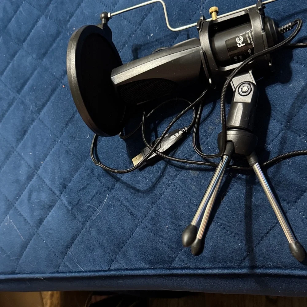Black microphone with Tripod Stand****FINAL MARKDOWN****